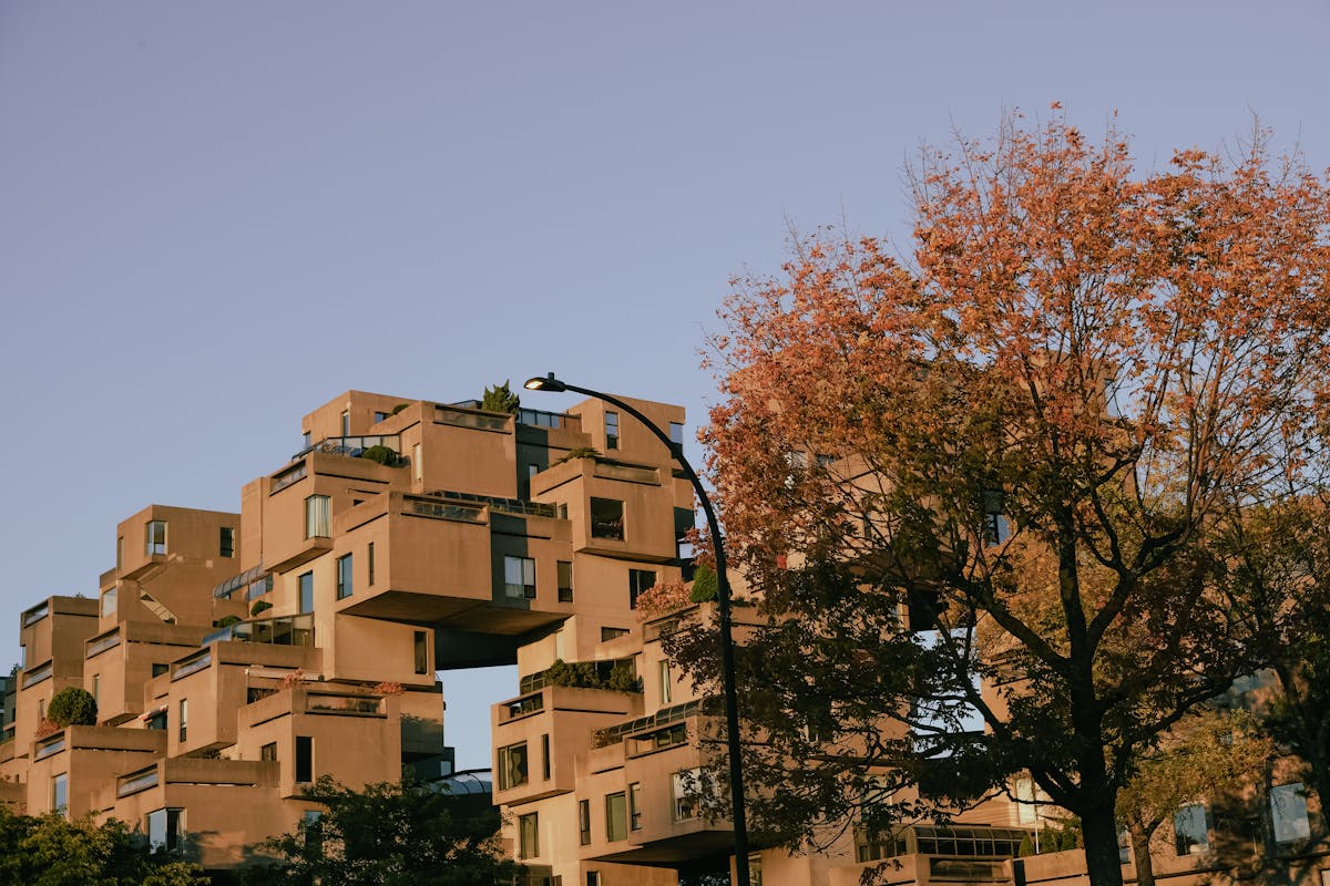 A view of the architectural marvel Habitat 67 in Montreal during fall.