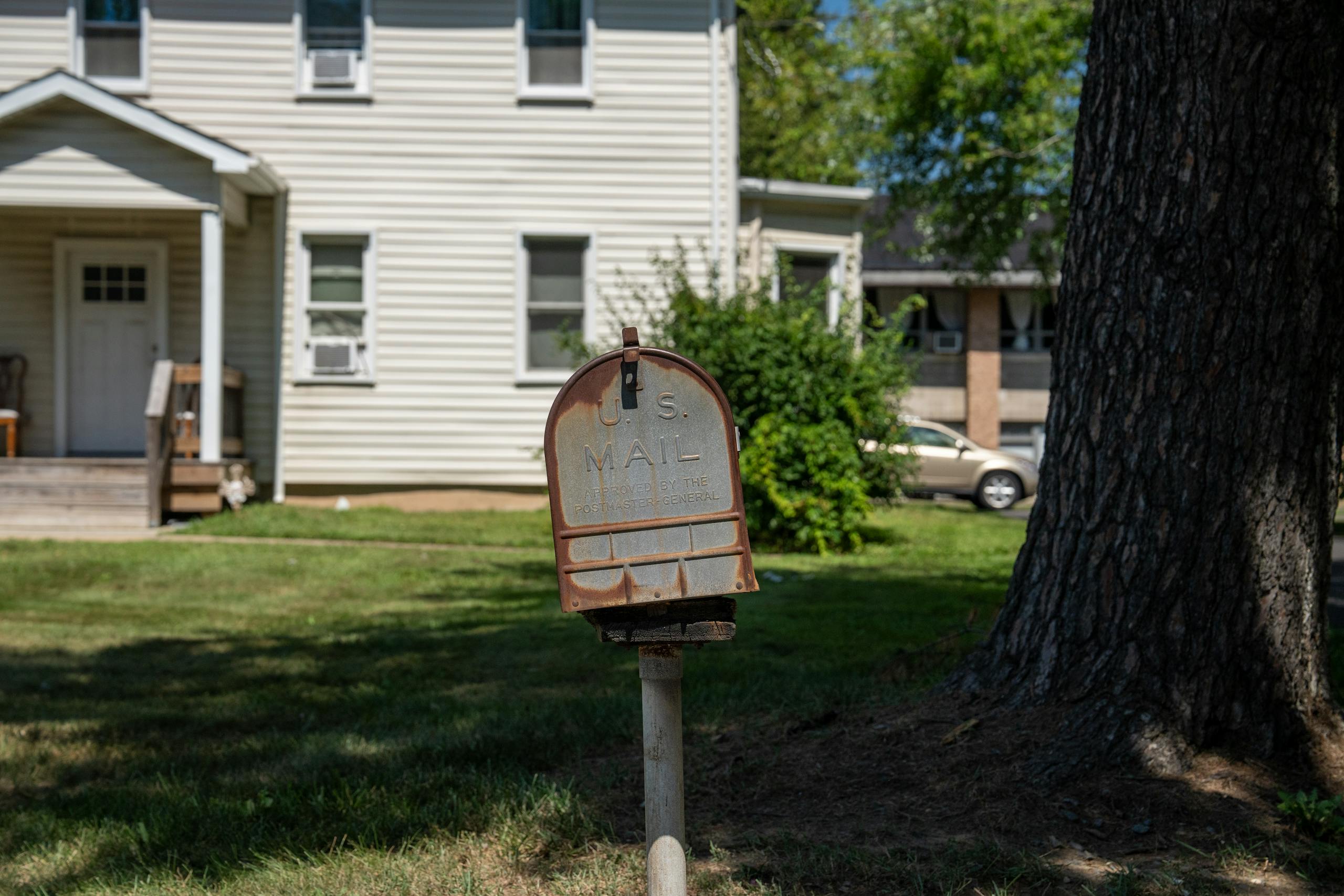 6 Ugly Ways the Supreme Court Abortion Pill Fight Could Shake U.S. Politics 3 A vintage US mailbox stands outside a suburban home in New Jersey, illustrating classic American life.
