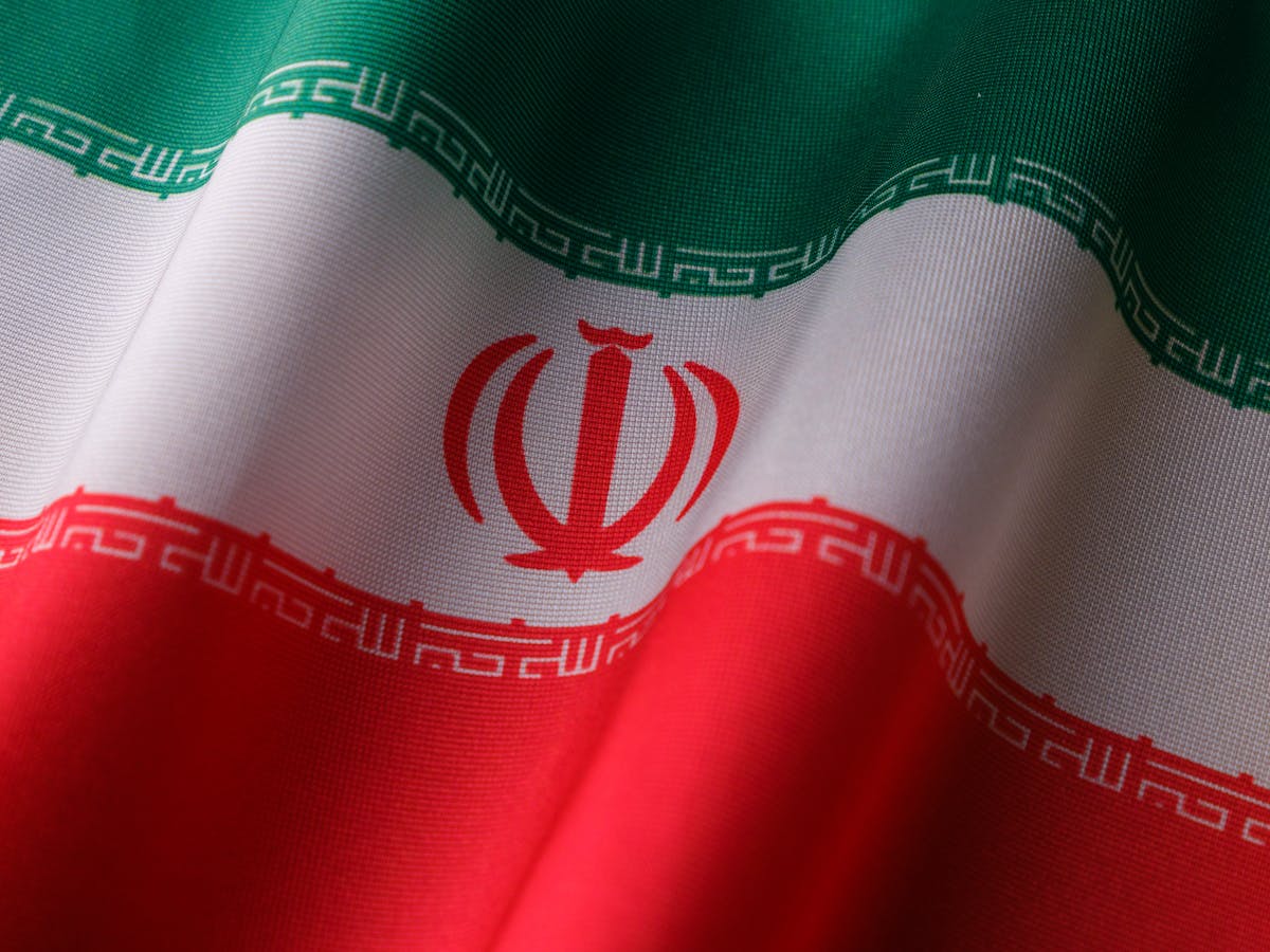 Iran-Linked Video Targeting Melania and Barron Trump Raises Security Concerns Amid Rising US Tensions 1 High-quality image of the Iranian national flag waving to symbolize patriotism and national pride.