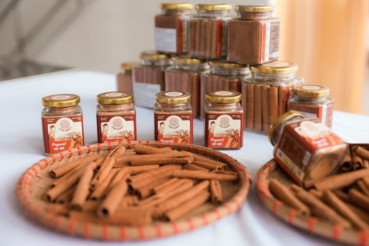 9 Common Foods That Could Be Riskier Than You Think 4 High-quality organic cinnamon sticks and powder beautifully arranged in glass jars and baskets for presentation.