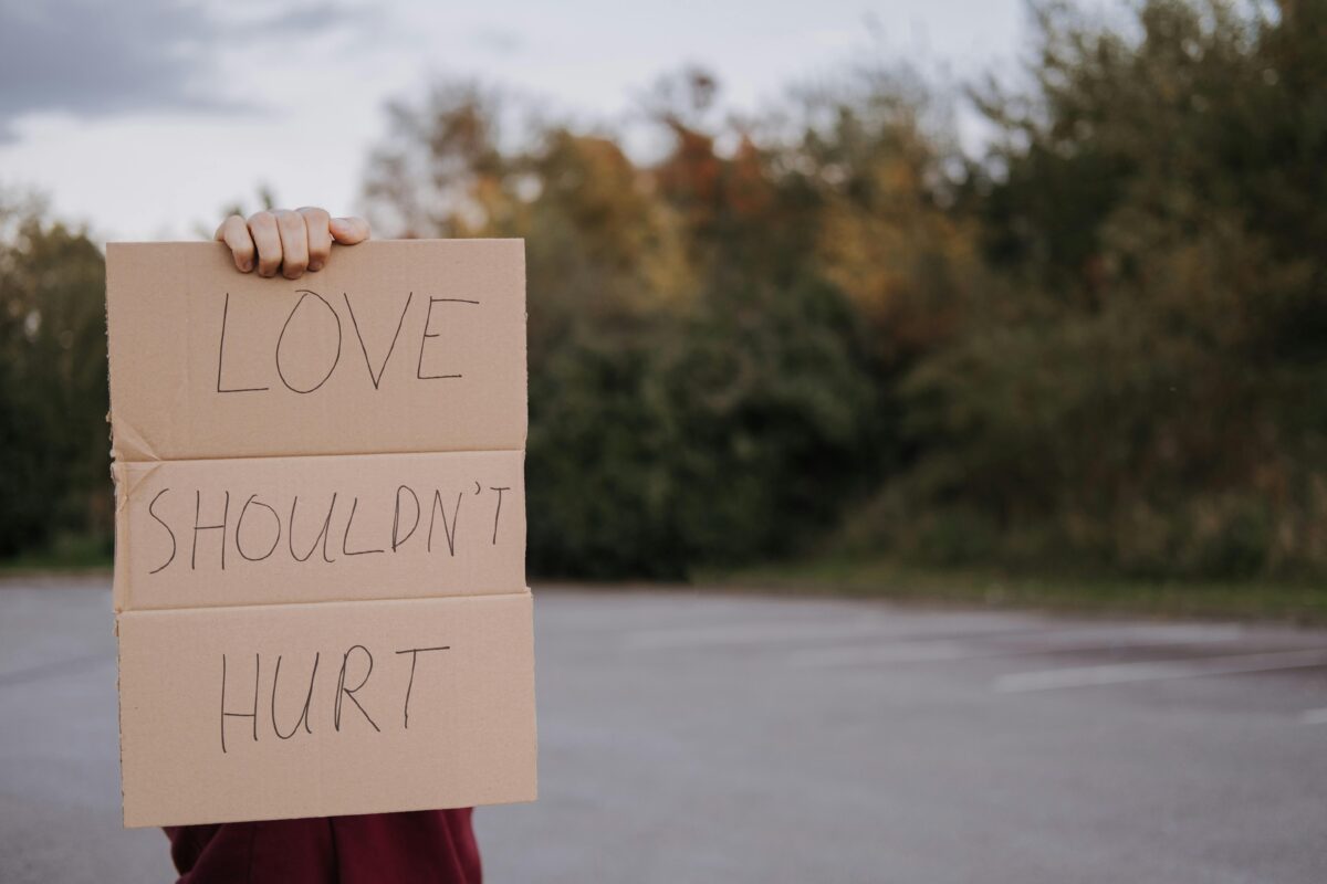 8 Painful Truths About Rebound Relationships People Learn Too Late 6 person-holding-cardboard-sign