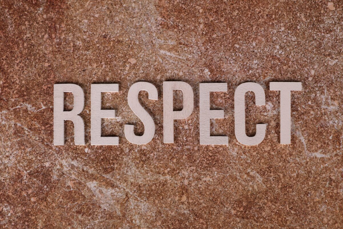 wooden-respect-letters-on-stone-surface