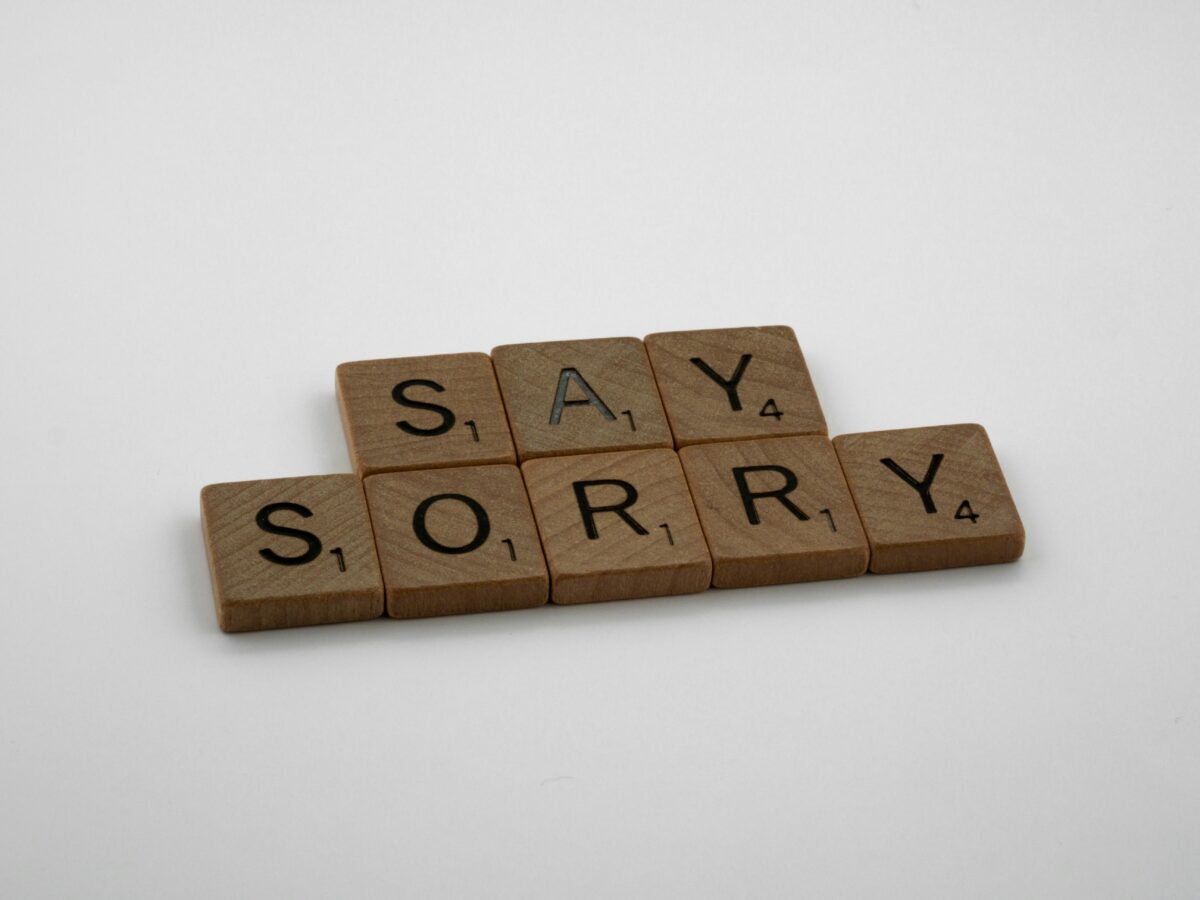 wooden-scrabbles-pieces-on-white-table