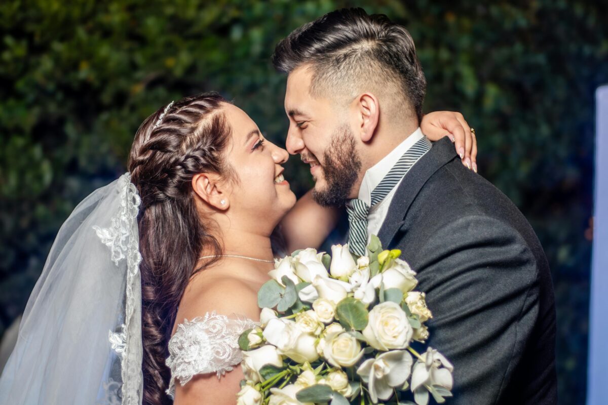 Social Security’s 2033 Funding Cliff Could Cost Newly Retired Couples $16,900 A Year. 1 romantic-wedding-couple-embracing-outdoors