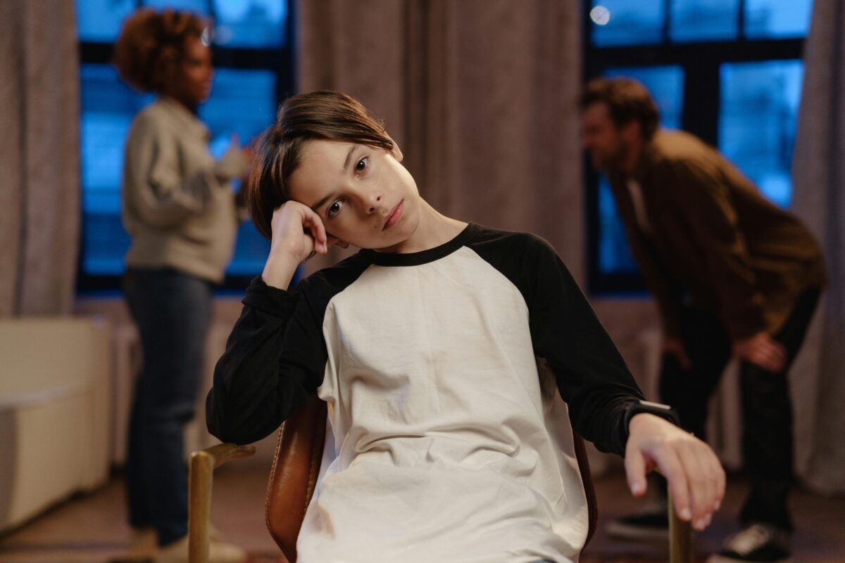 a-boy-sitting-on-a-chair