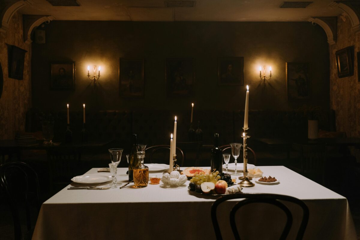table-setting-in-a-candle-lit-room