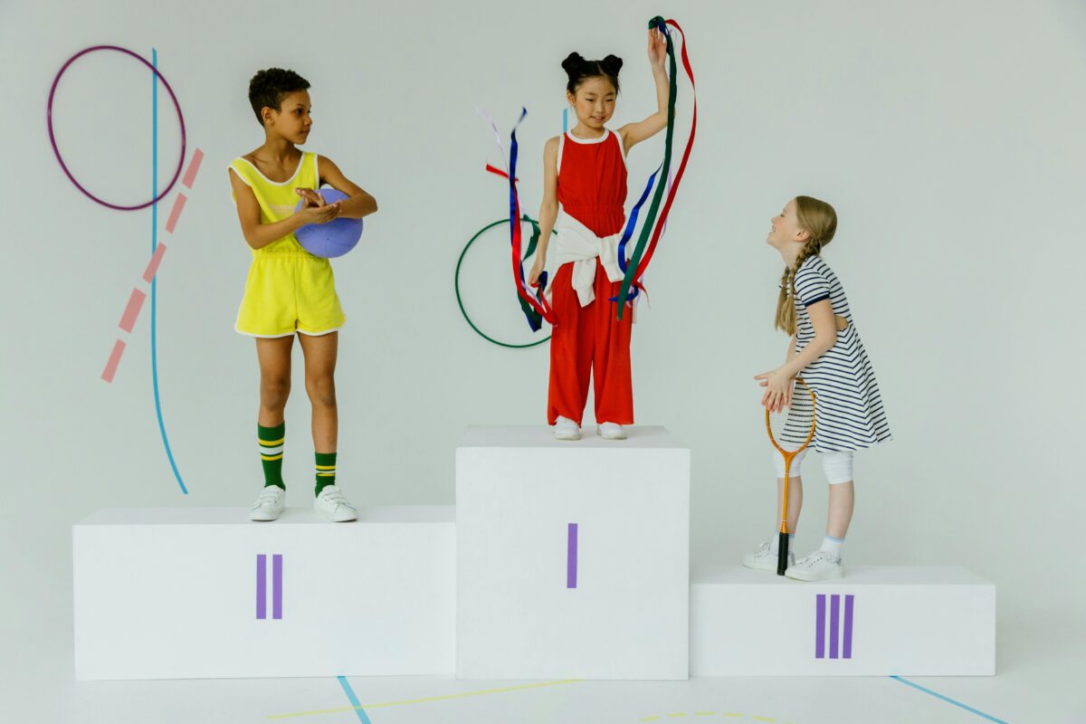 girls-standing-on-an-olympic-podium-stand