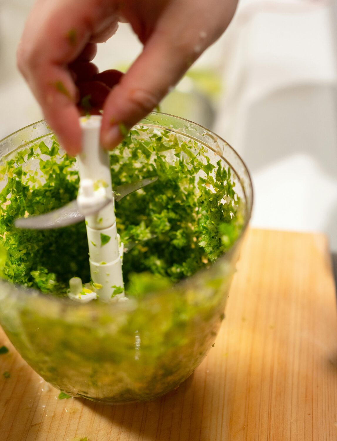 preparing-fresh-pesto-in-a-kitchen-setting