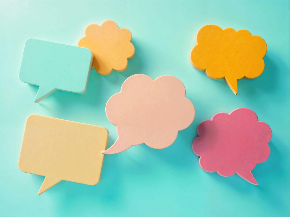colorful-speech-bubbles-on-blue-background
