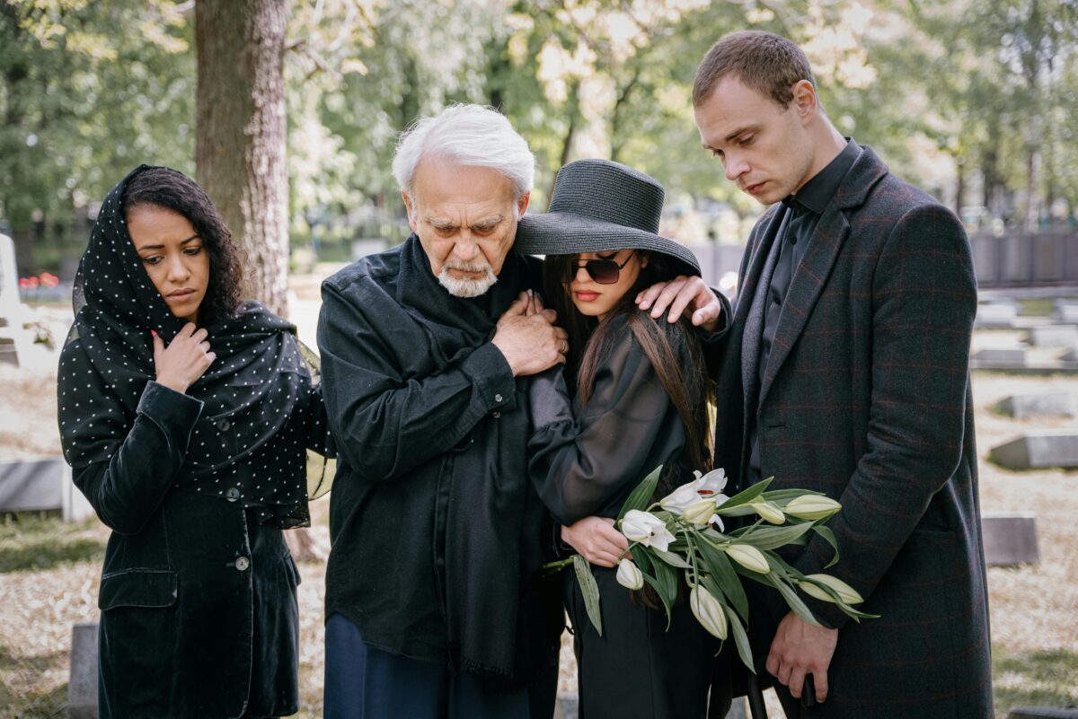 a-family-mourning-in-a-cemetery