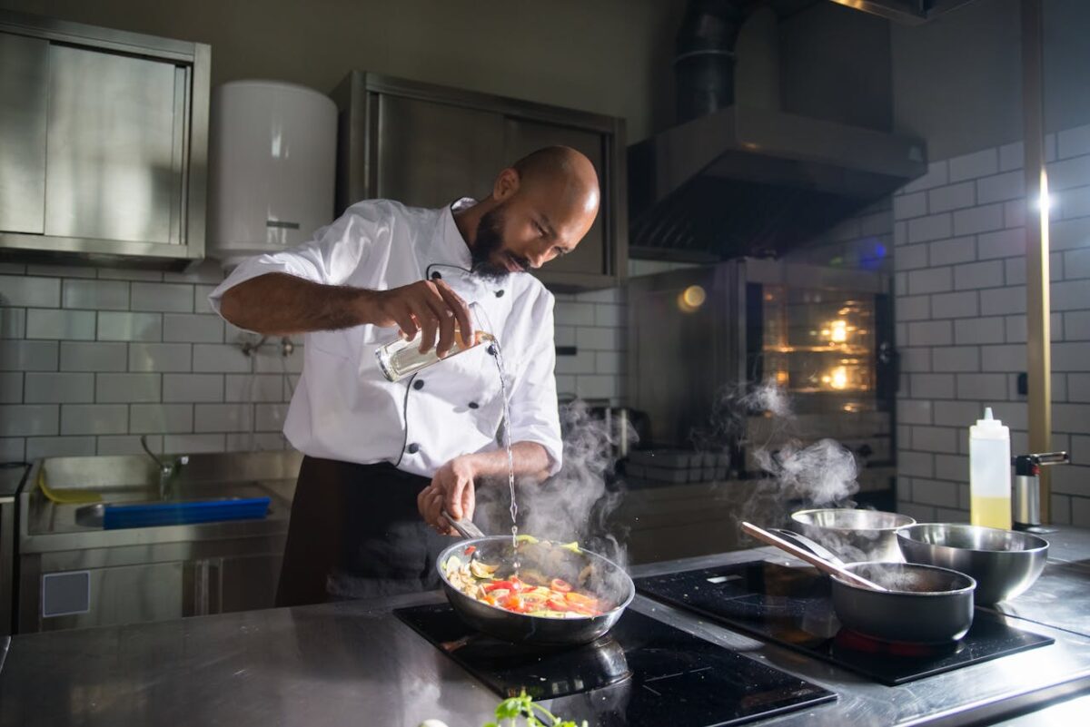 /a-chef-cooking-in-the-kitchen-
