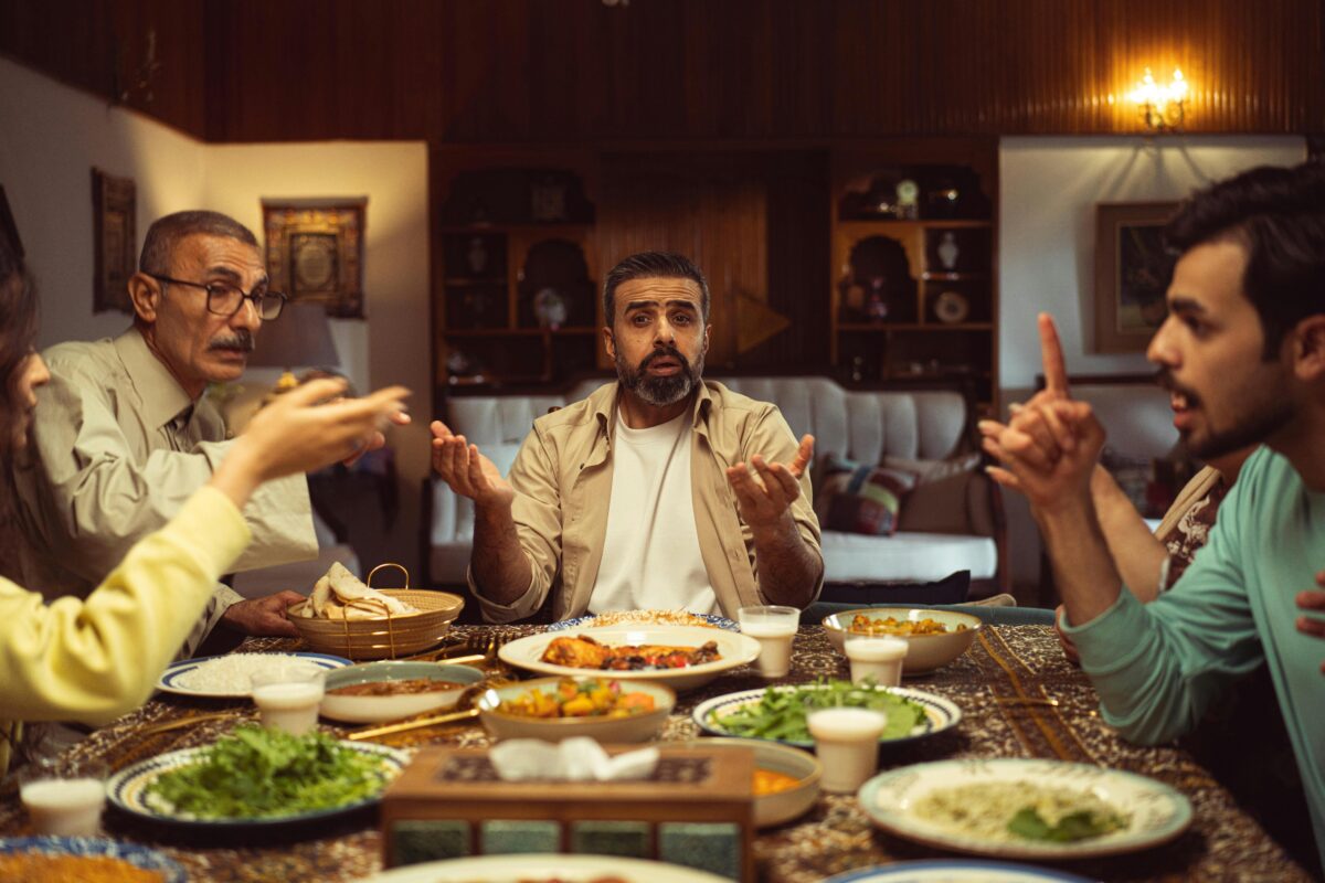 family-gathering-around-a-dinner-table