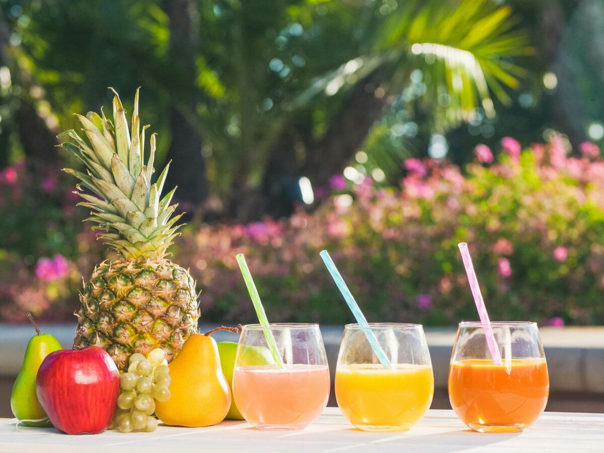 a-variety-of-fruit-juices-on-a-table