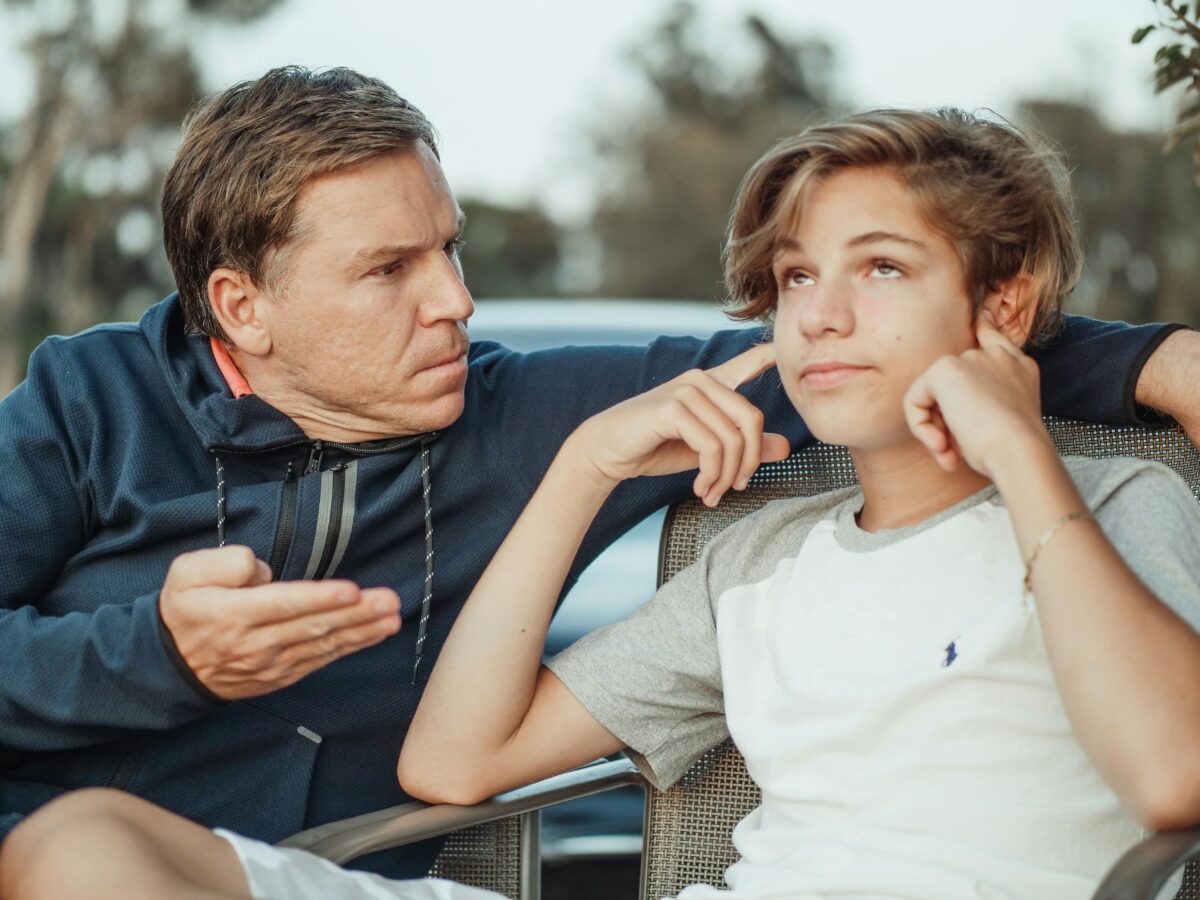 man-scolding-his-son