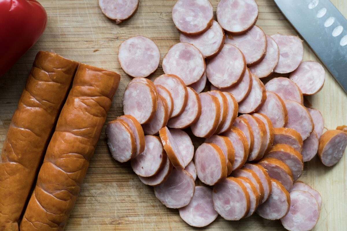 chopped-sausages-on-a-wooden-chopping-board