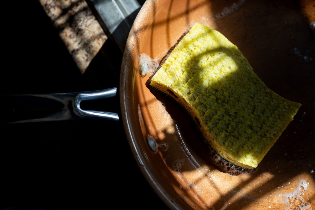 yellow-sponge-in-copper-pan-with-dramatic-shadows