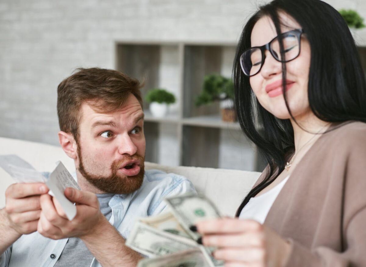 couple-talking-while-sitting-on-the-couch