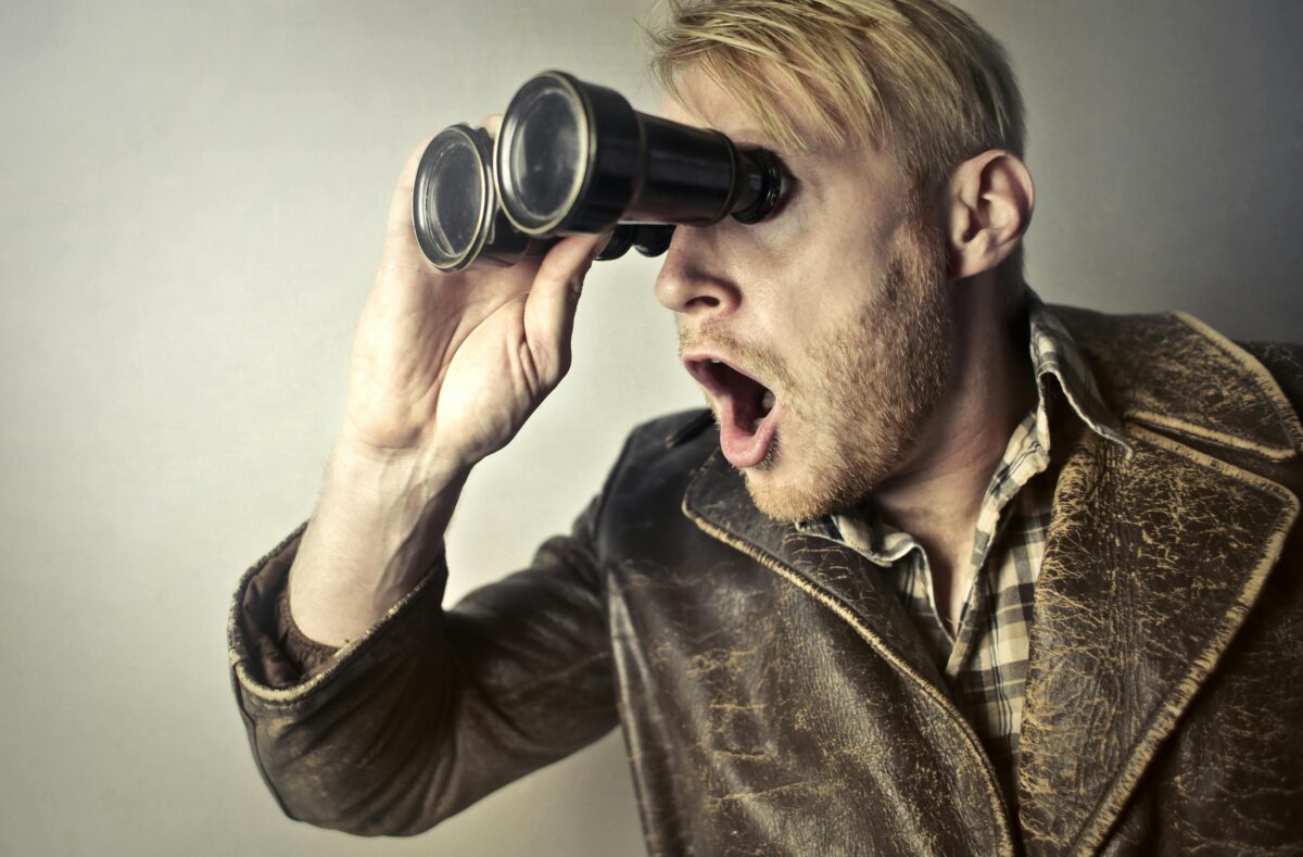 7 Quiet Signs Your Brain May Be in Trouble Before Memory Fails 1 man-in-brown-leather-jacket-using-binoculars