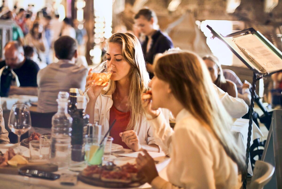 12 Purchases Americans Regret Most During Tough Economic Times 3 woman-drinking-wine