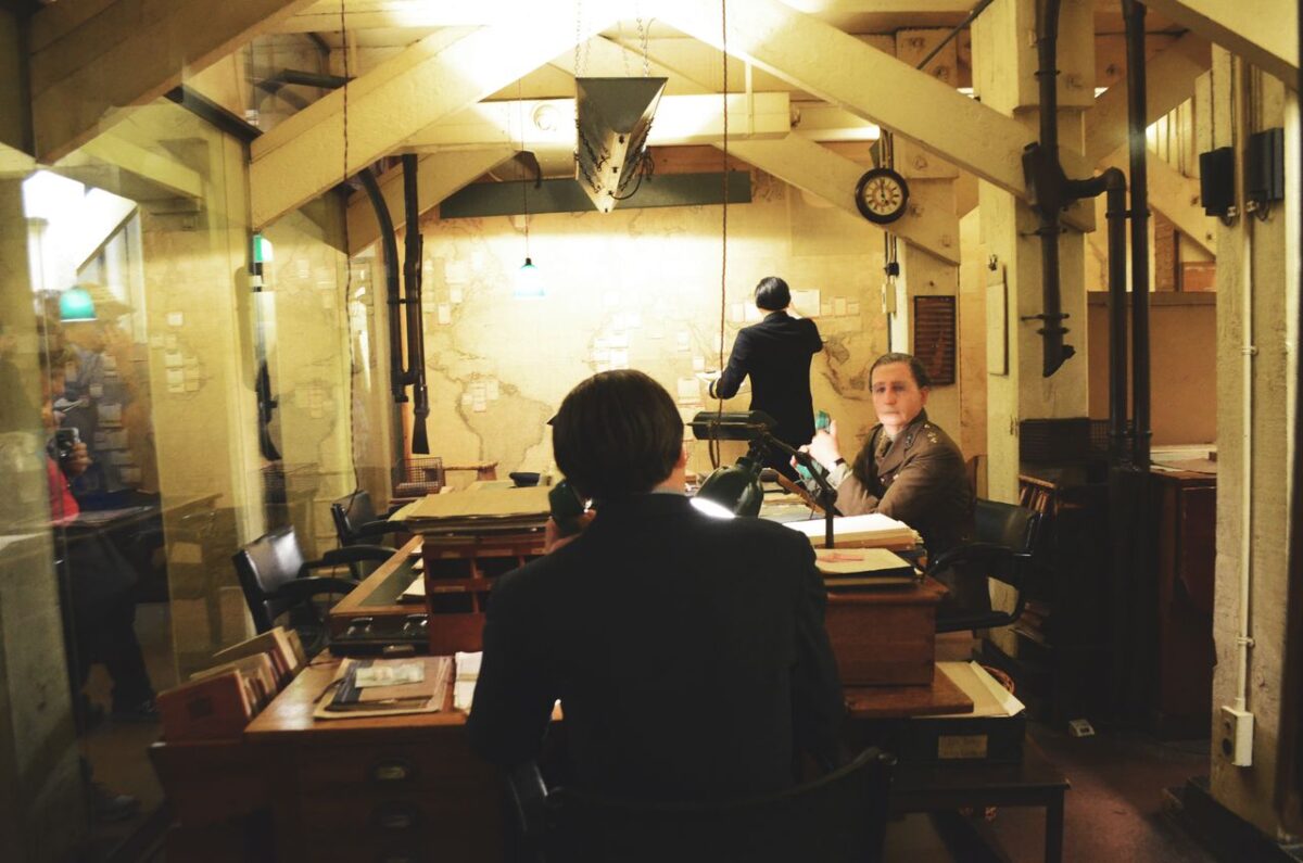 10 Dark Cold War Operations That Still Feel Disturbing Today 2 man-sitting-on-chair-leaning-on-table
