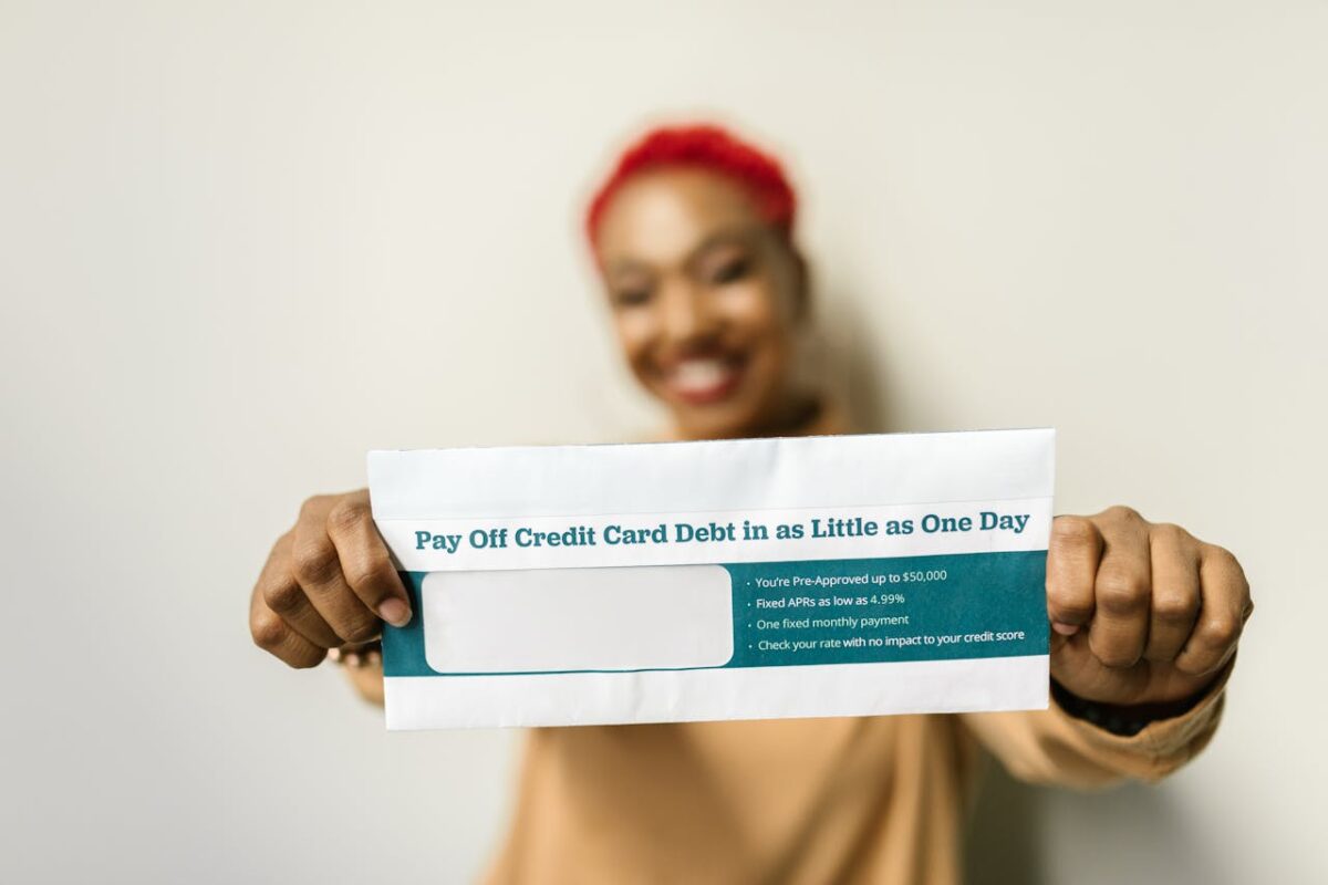 a-woman-holding-an-envelope-