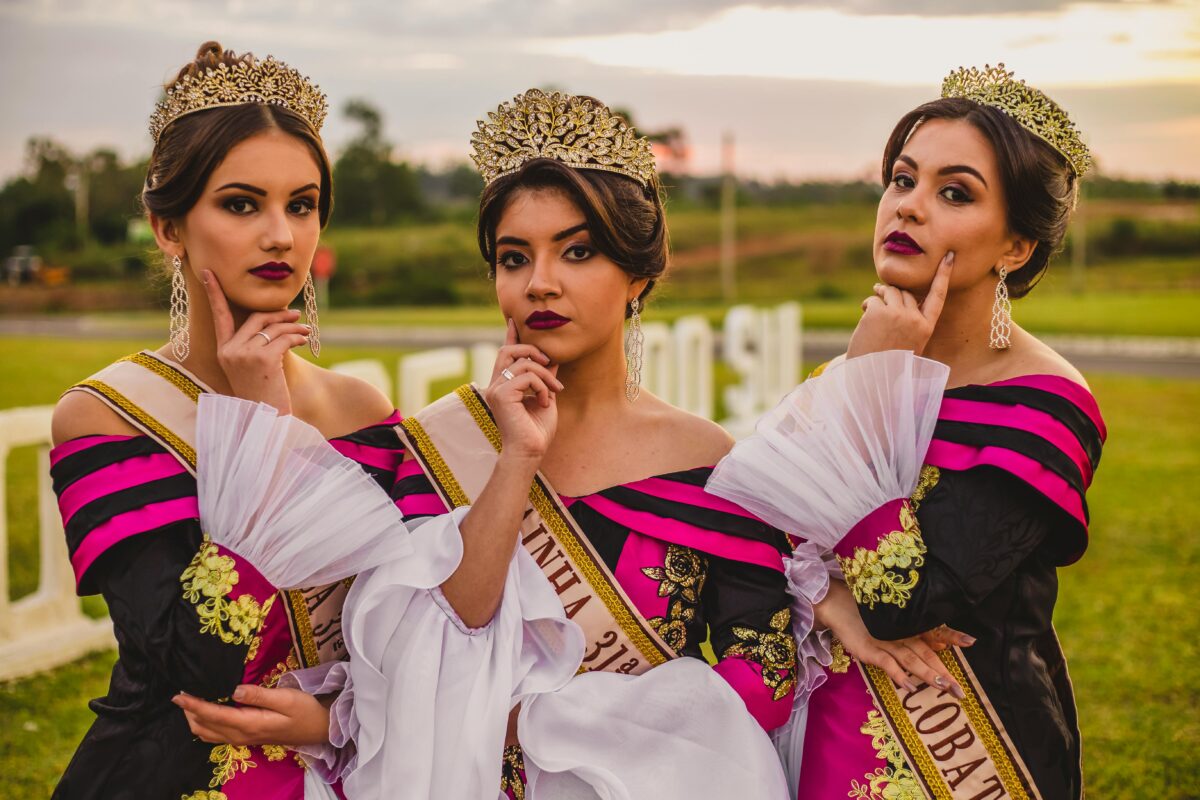 women-in-white-and-purple-gowns