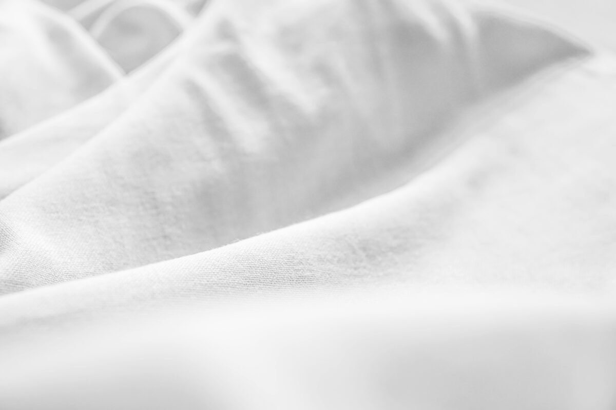 8 Creepy Ways Clothing Helps Cults Control People 3 close-up-shot-of-a-white-textile