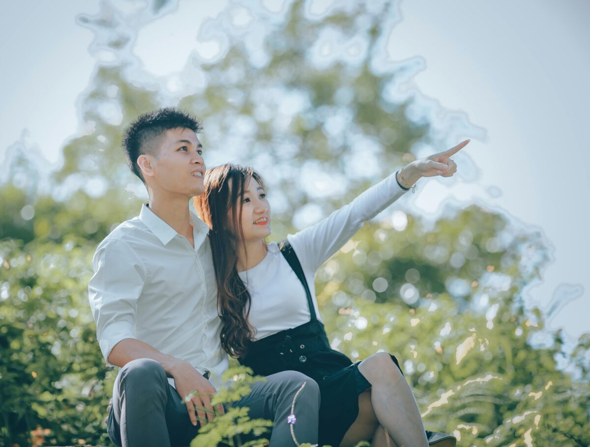 a-woman-pointing-beside-a-man