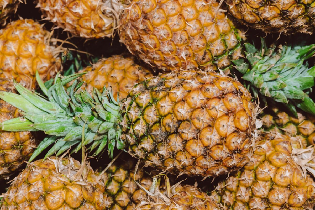 fresh-pineapples-in-a-market-display