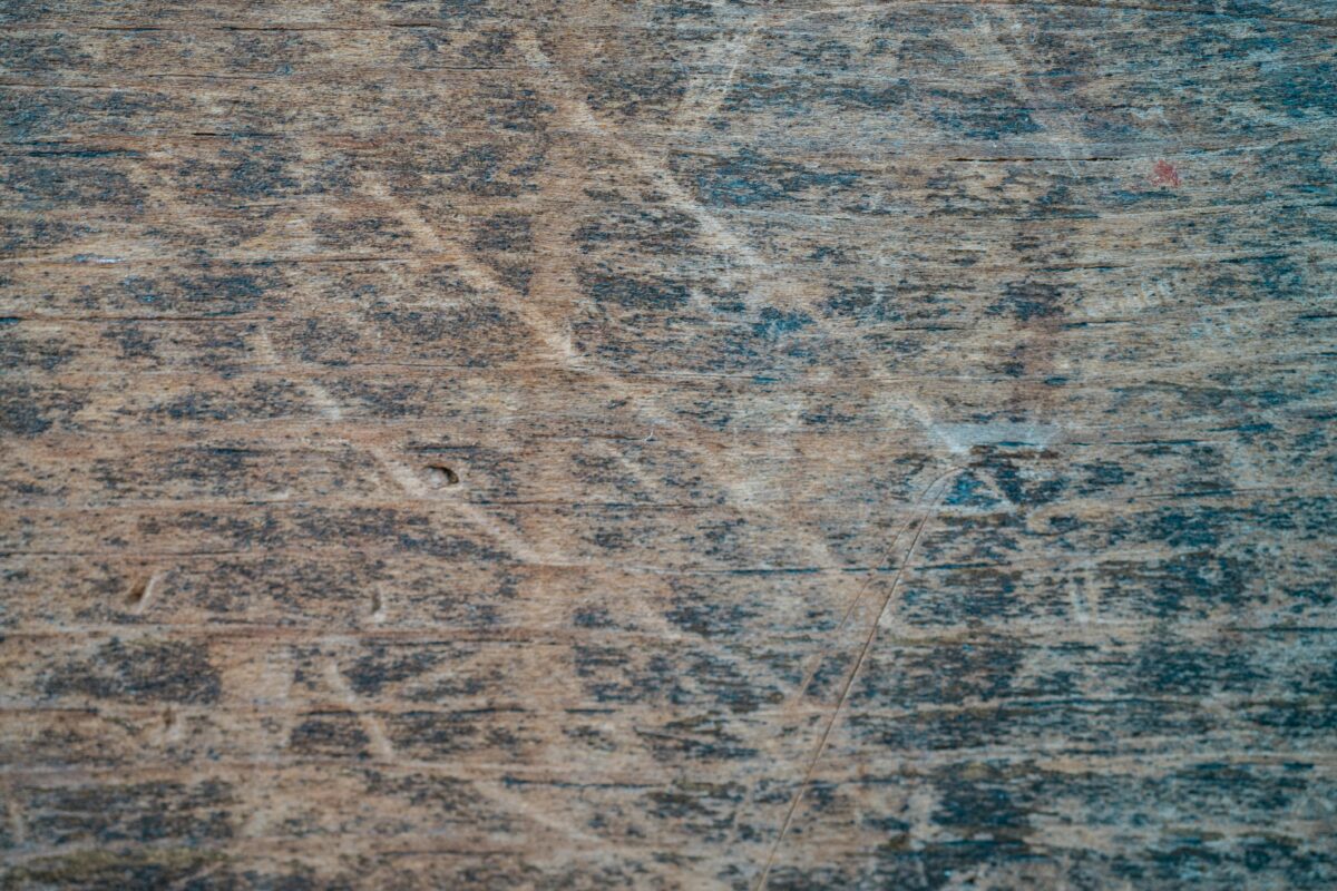 scratches-on-wooden-surface-in-close-up-photography