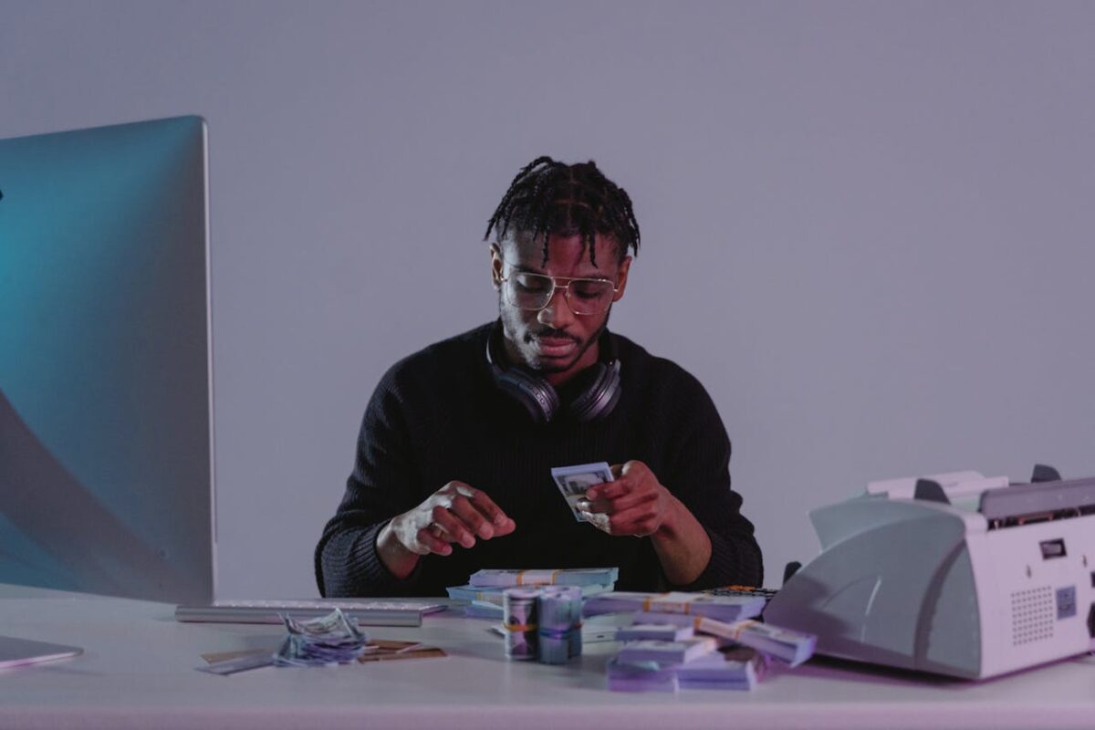 a-man-holding-money-bills-
