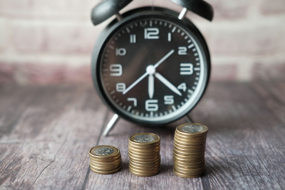 stacks-of-coins-and-an-alarm