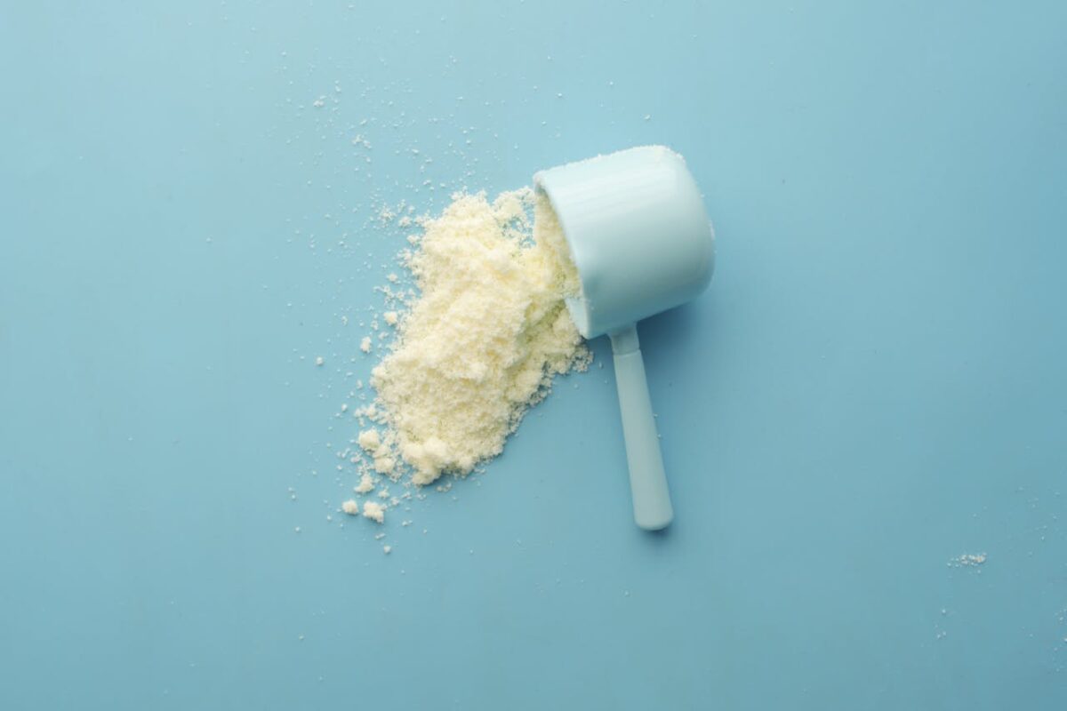 8 Reasons Why DIY Smoothies Are Destroying Your Waistline 2 photo-of-a-white-powder-and-a-scoop-lying-on-the-blue-background-