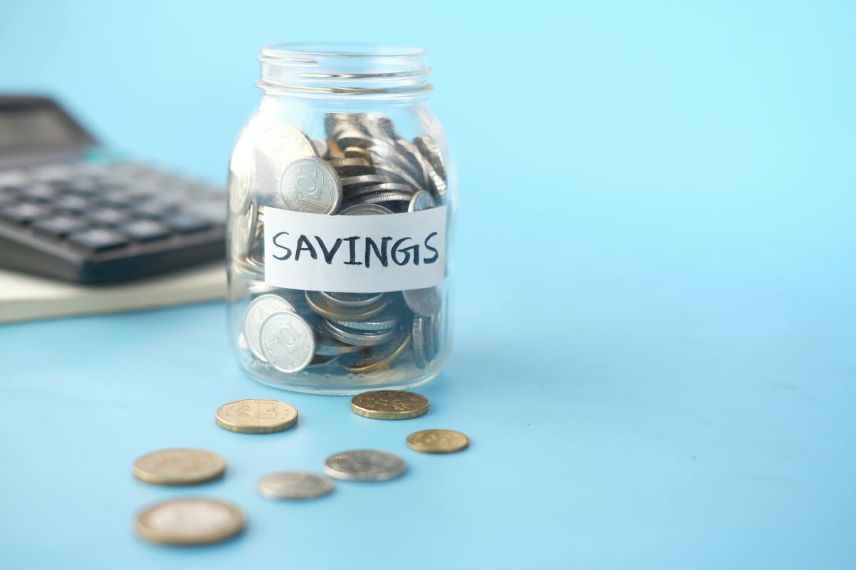 clear-glass-jar-with-silver-coins