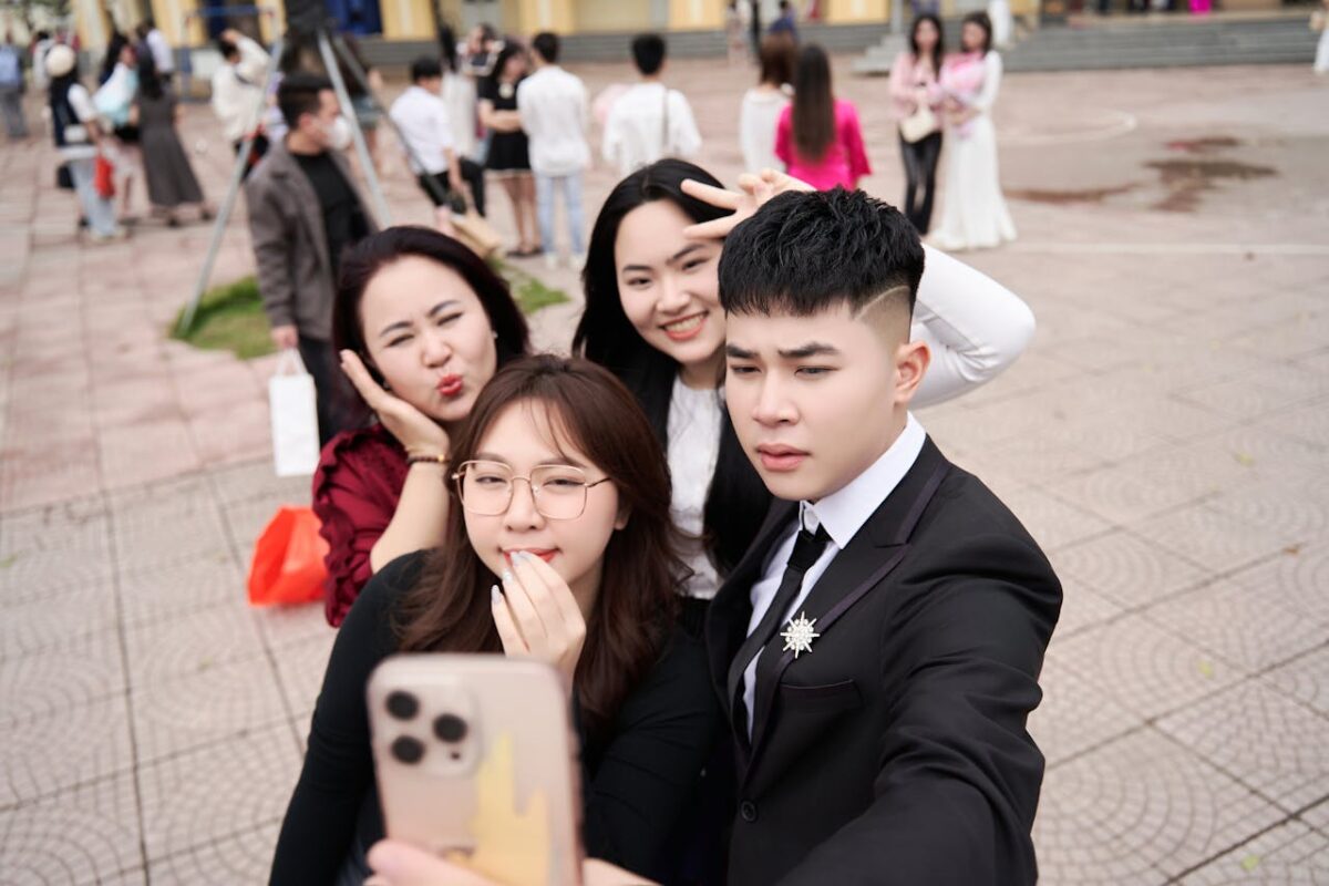 group-of-friends-taking-a-selfie-outdoors-