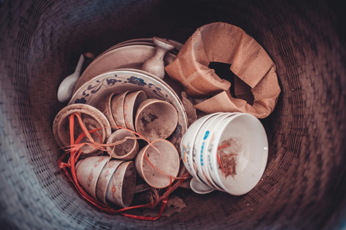 old-dusted-porcelain-in-a-basket
