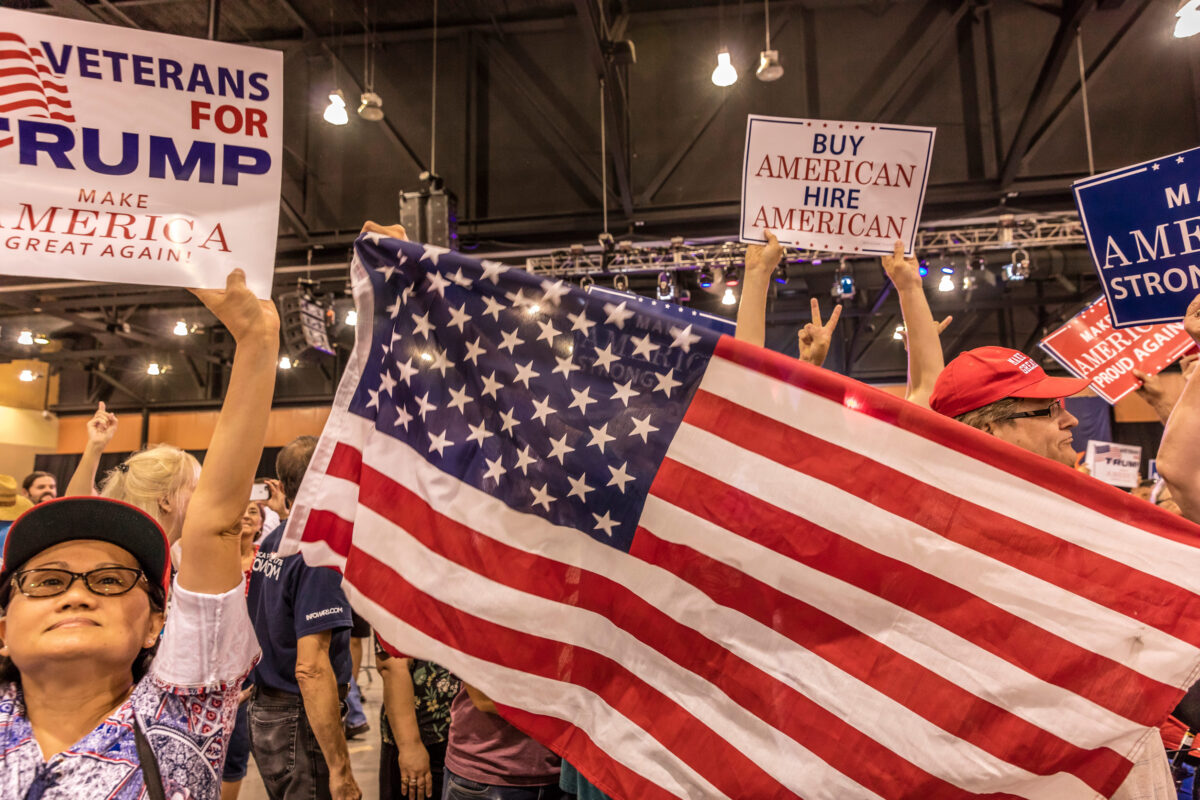 AUGUST 22, 2017, PHOENIX, AZ   U.S. Crowds hold signs for President Donald J. Trump at the Phoenix Convention Center during a Trump rally