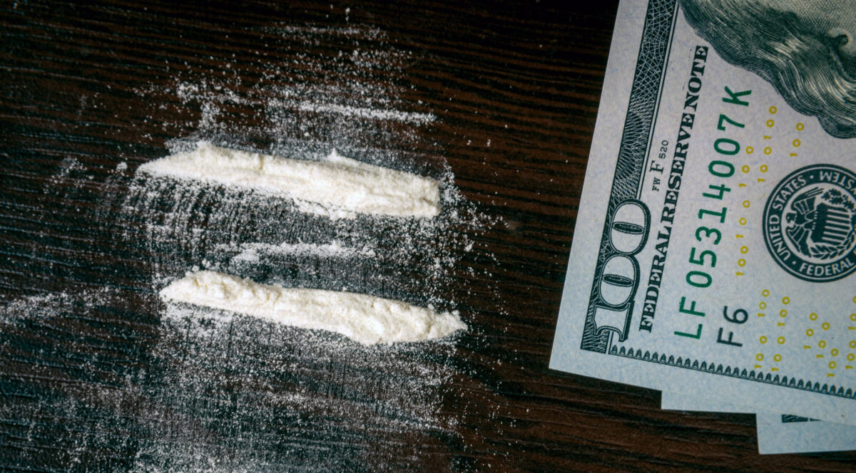 Police and investigators confirmed 2 Suspects Arrested After Crashing Through Camp Pendleton's gate with 112 Pounds of Cocaine and Fentanyl 1 Cocaine powder on the table with money