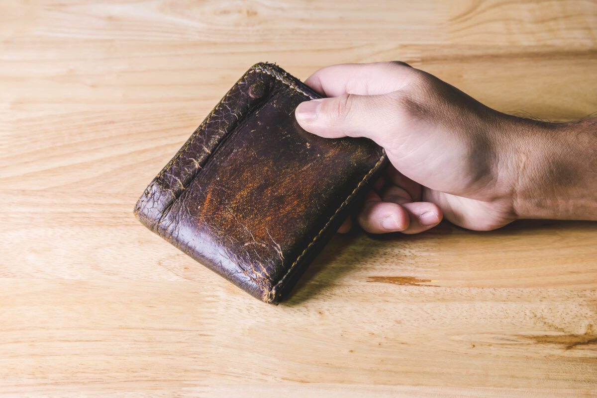 save money for investment concept hand hold a wallet