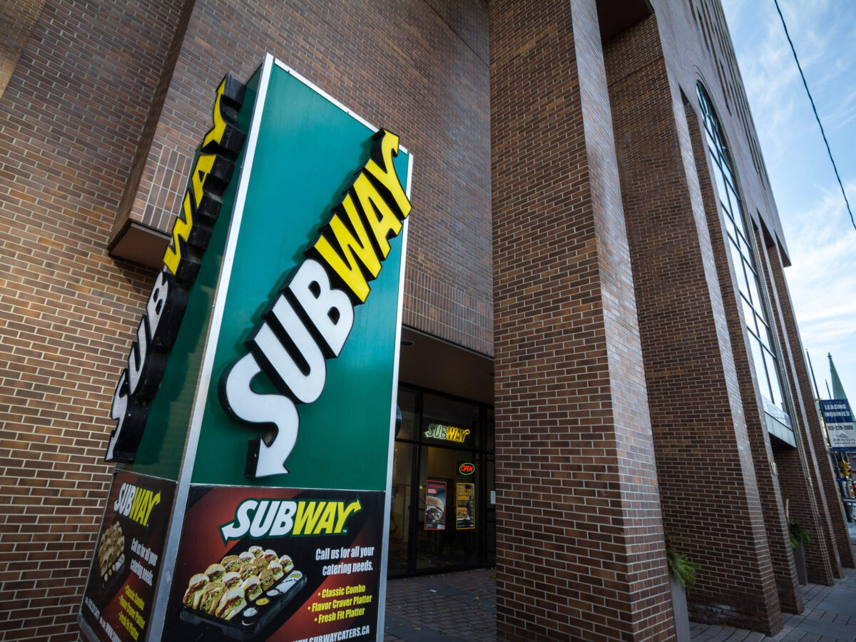 OTTAWA, CANADA - NOVEMBER 11, 2018: Subway logo in front of their local Restaurant in Ottawa, Ontario. Subway is a fast food chain specialized in sandwiches and salads