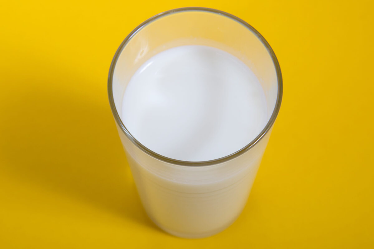 He profits off raw milk that’s making people sick. The government isn’t stopping him. 1 Glass of fresh milk on yellow background