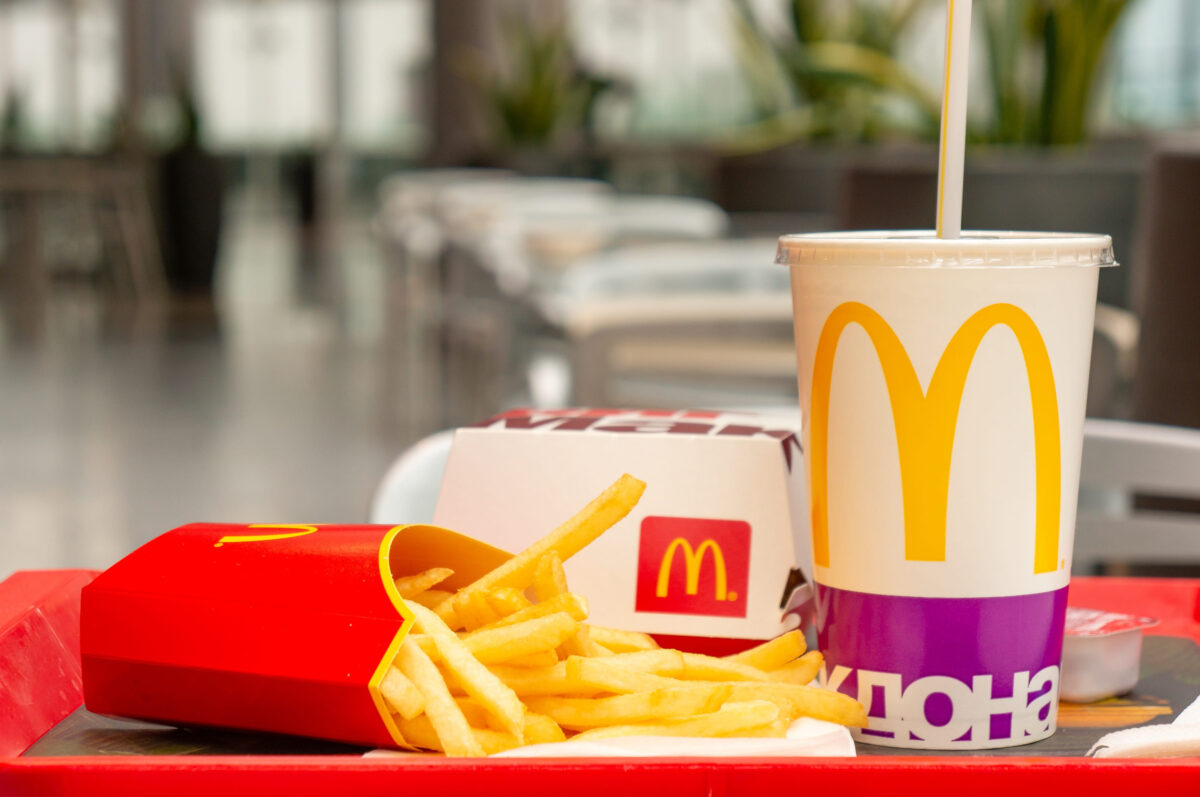 12 Chain Restaurants That Lost People the Moment Prices Skyrocketed 1 Moscow, Russia, March 15 2018: McDonalds Big Mac hamburger menu, French Fries and Coca Cola. Fast meal food. Snack in cafe dinner
