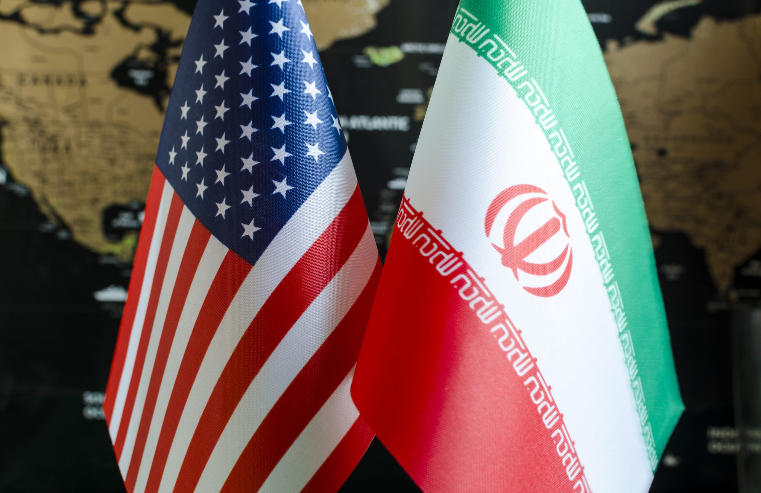 fragments of national flags of Iran and the United States in close-up