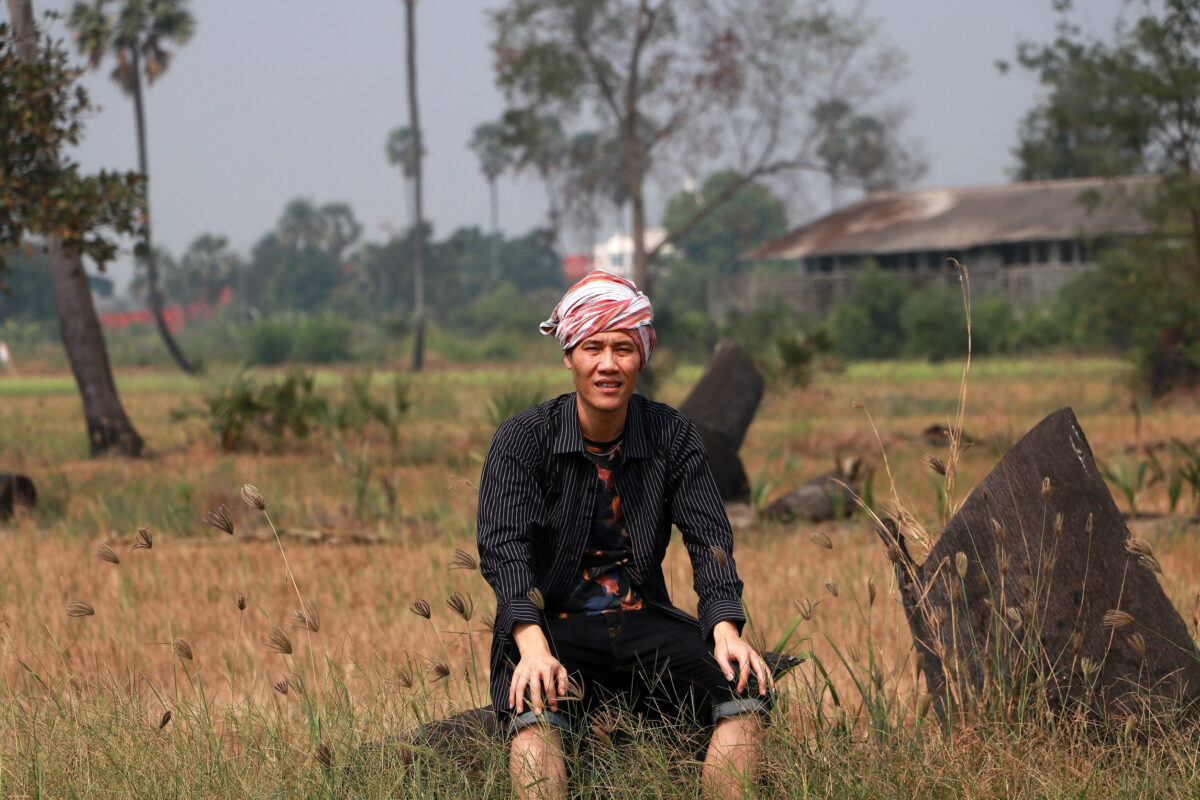 10 Most Dangerous Men to Ever Walk the Earth 3 Agriculturist male with loincloth wrapped over the head and sitting relax on the nature
