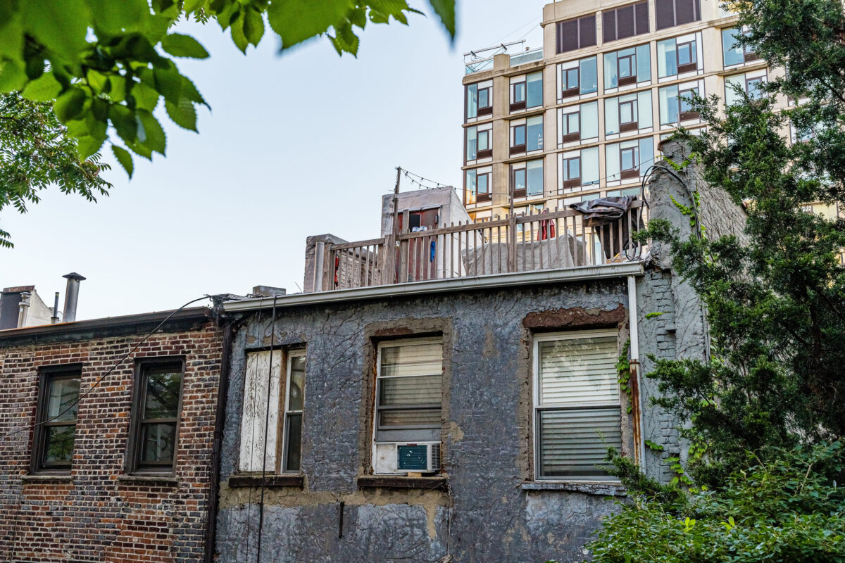 Manhattan, New York, USA - August 29, 2019: High Line Park in Manhattan. View of the surrounding houses and parks. High Line is a popular linear park built on elevated railway tracks.