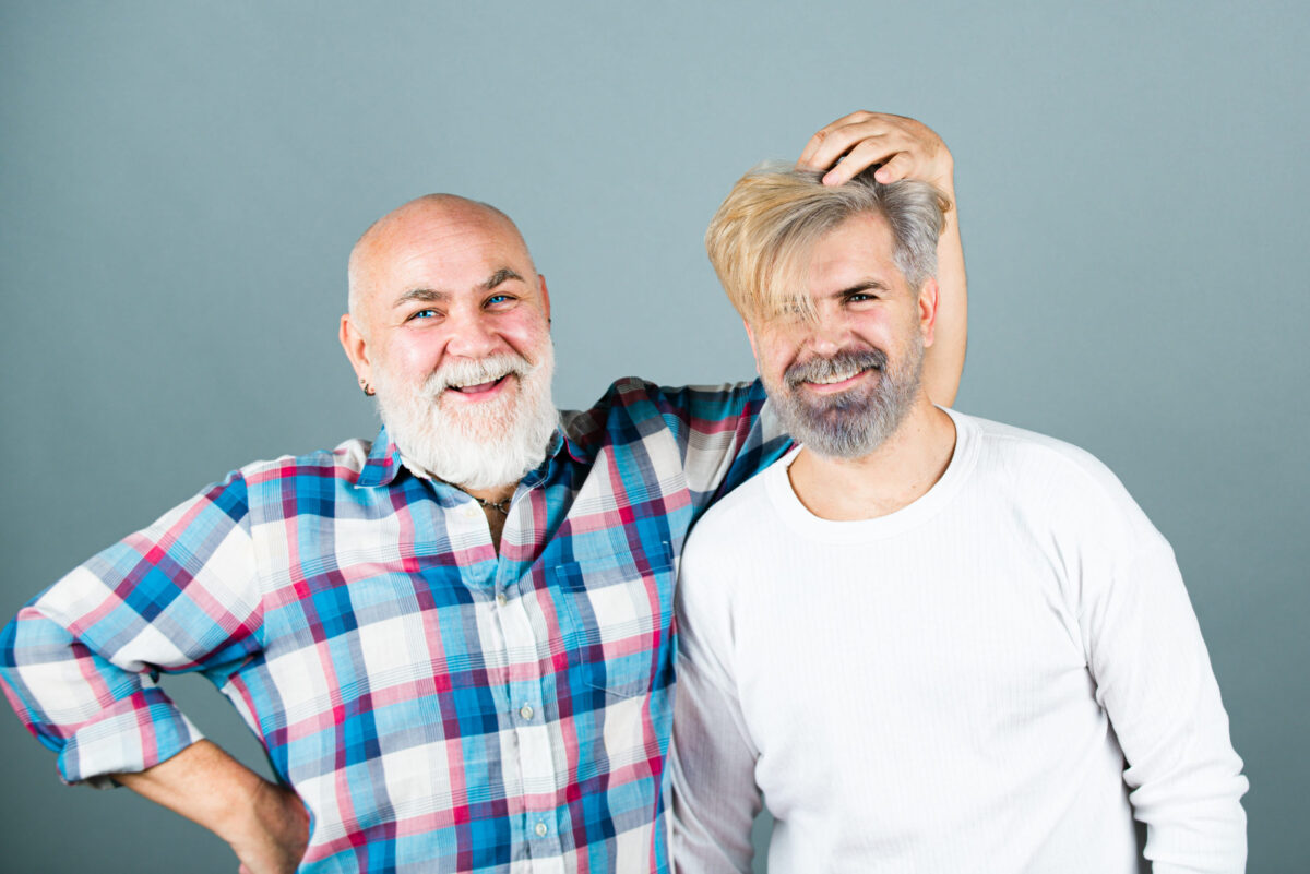 Old father and son. Elderly grandfather. Senior man Granddad. Older younger generations