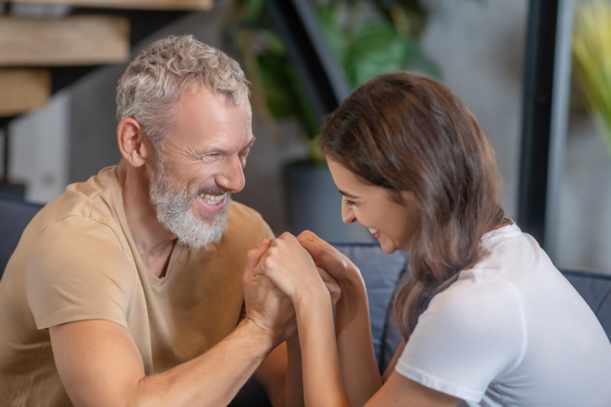 7 Types of Women Mature Men Rarely Walk Away From 1 Happy family. Bearded man and young woman hugging and enjoying being together