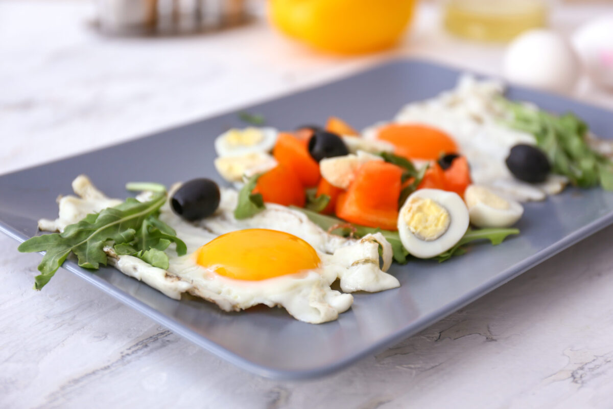10 Worst Prison Meals You Would Never Want to Eat 3 Plate with tasty salad on table, closeup