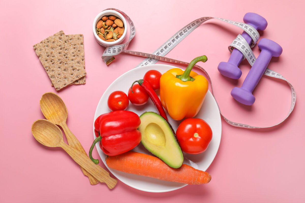 11 Common Pitfalls That Prevent People From Getting In Shape 3 Different healthy food with measuring tape and dumbbells on color background. Diet concept