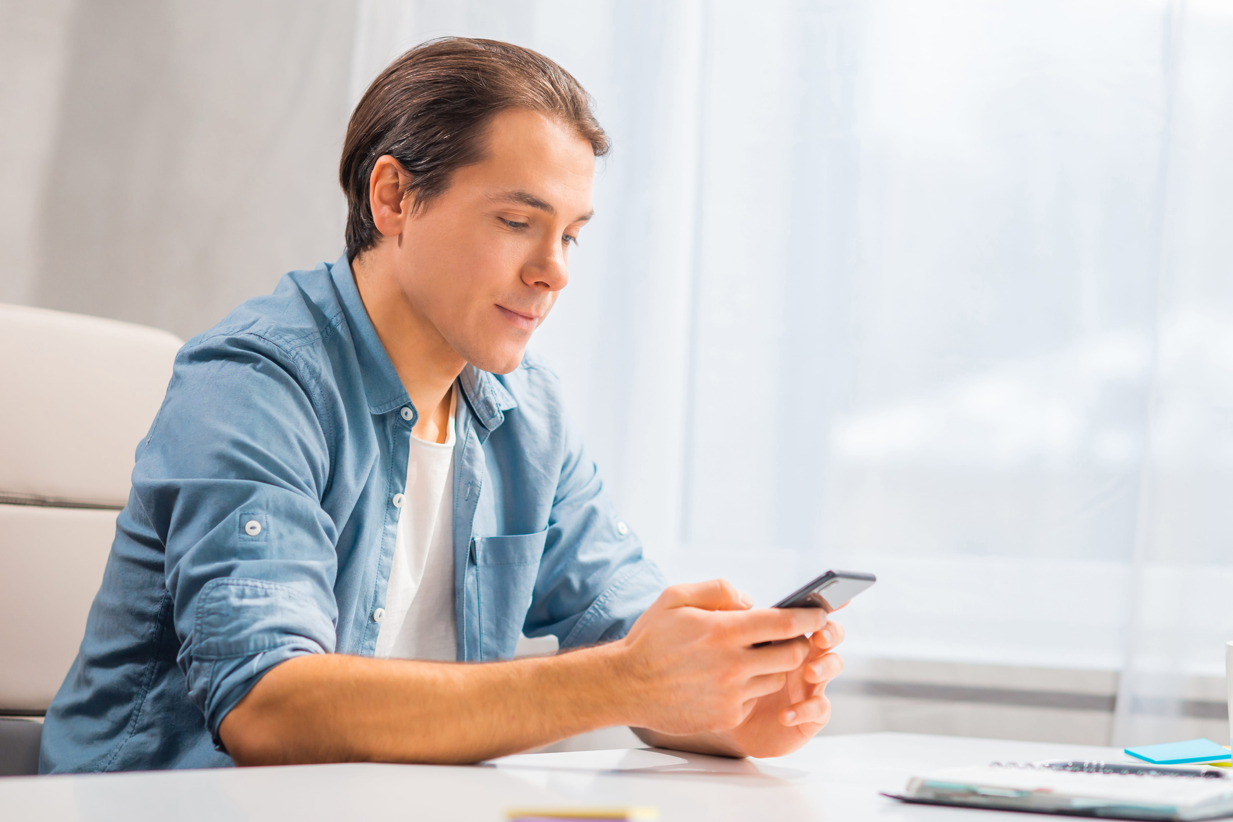 A man texting on the phone